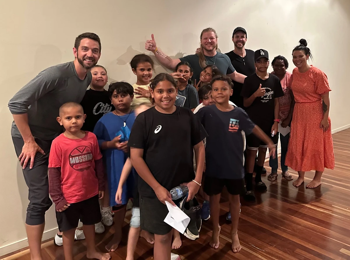 Cypress Fyre and a group of students celebrating a workshop together